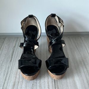 Jimmy Choo Portia Patent Leather Wedges Size 6 US in really good condition.